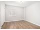 Cozy bedroom with wood flooring, a window with blinds, and a closet at 1800 Clairmont Lk # 412, Decatur, GA 30033