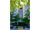 Apartment building exterior featuring the 1800 entrance and lush green trees at 1800 Clairmont Lk # 412, Decatur, GA 30033