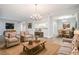 Well-appointed living room with hardwood floors, open floor plan, and lots of light at 1800 Clairmont Lk # 412, Decatur, GA 30033