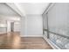 Bright living room with wood-look floors, large windows, and chandelier lighting fixture at 1800 Clairmont Lk # 412, Decatur, GA 30033