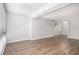 Open living space featuring wood-look floors and neutral color palette at 1800 Clairmont Lk # 412, Decatur, GA 30033