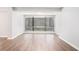 Bright living space featuring wood-look floors, neutral walls, and natural light from windows at 1800 Clairmont Lk # 412, Decatur, GA 30033
