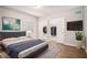 Staged main bedroom features wood-look floors and closet space at 1800 Clairmont Lk # 412, Decatur, GA 30033