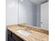 Bathroom features a granite countertop vanity and a modern faucet at 2067 Kinridge Ct, Marietta, GA 30062