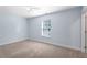Bedroom has carpet, light blue walls and one window at 2067 Kinridge Ct, Marietta, GA 30062