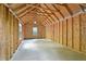 Empty storage building interior with exposed framing and a window at 2067 Kinridge Ct, Marietta, GA 30062