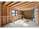 Interior view of the storage building with exposed framing, shelving, and a window at 2067 Kinridge Ct, Marietta, GA 30062