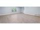 Bright and airy living room showcasing spacious tile floors and neutral color palette at 2067 Kinridge Ct, Marietta, GA 30062