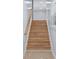 Classic wooden staircase with a simple handrail, leading to the upper level at 2067 Kinridge Ct, Marietta, GA 30062
