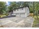 Charming two-story home with a two-car garage and freshly painted white brick at 4760 Silverdale Rd, College Park, GA 30349