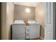 Functional laundry room featuring a side-by-side washer and dryer at 992 Brian Ln, Forest Park, GA 30297