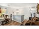 Cozy living room featuring wood floors, chandelier, and a stylish couch at 992 Brian Ln, Forest Park, GA 30297