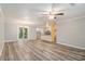 Spacious living room with stylish wood floors and sliding glass doors at 22 Cardinal Ln, Jonesboro, GA 30238