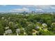Expansive aerial view of property with lush greenery and city skyline at 4048 Navajo Trl, Brookhaven, GA 30319