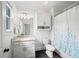 Bathroom featuring vanity with granite counters and a shower/tub combo at 4048 Navajo Trl, Brookhaven, GA 30319