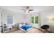 Bright bedroom features hardwood floors and two windows at 4048 Navajo Trl, Brookhaven, GA 30319