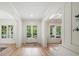 Bright foyer features hardwood floors and elegant French doors at 4048 Navajo Trl, Brookhaven, GA 30319