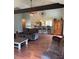 Comfortable living room includes hardwood floors, ceiling fan and view into the kitchen bar seating area at 17 Country Walk, Cartersville, GA 30121