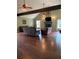Spacious living room features a ceiling fan, hardwood floors, stone fireplace, and comfortable seating at 17 Country Walk, Cartersville, GA 30121