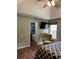 A bedroom with a bed and easy access to the bathroom and bathtub at 17 Country Walk, Cartersville, GA 30121