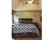 This spacious bedroom features a trey ceiling, ceiling fan, and matching nightstands at 17 Country Walk, Cartersville, GA 30121