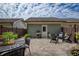 Outdoor patio seating, potted flowers and greenery create a relaxing backyard retreat at 239 S Village Sq, Canton, GA 30115