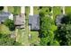Aerial view of house with solar panels, backyard, and mature tree coverage at 2804 Skyland Ne Dr, Brookhaven, GA 30341