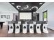 Entertainer's basement showcasing a large screen, wet bar, and modern seating at 2804 Skyland Ne Dr, Brookhaven, GA 30341
