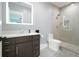 Modern bathroom features a sleek vanity, glass-enclosed shower, and contemporary fixtures at 2804 Skyland Ne Dr, Brookhaven, GA 30341