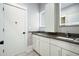 Modern bathroom featuring double sinks, stylish vanities, and elegant fixtures at 2804 Skyland Ne Dr, Brookhaven, GA 30341