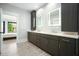 Bathroom features double vanity, hardwood floors, and LED mirrors at 2804 Skyland Ne Dr, Brookhaven, GA 30341