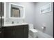 Elegant powder room featuring a modern vanity, marble countertop, and contemporary fixtures at 2804 Skyland Ne Dr, Brookhaven, GA 30341