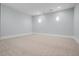 Carpeted bedroom with neutral colors and ample space at 2804 Skyland Ne Dr, Brookhaven, GA 30341