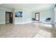 Bonus room with luxury vinyl flooring, accent lighting, and minimalist decor with a unique art piece at 2804 Skyland Ne Dr, Brookhaven, GA 30341