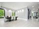 Spacious dining room with modern lighting, stylish gray walls, and lovely wood-look flooring at 2804 Skyland Ne Dr, Brookhaven, GA 30341