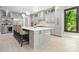 Spacious kitchen featuring gray cabinets, quartz countertops, stainless steel appliances and large center island at 2804 Skyland Ne Dr, Brookhaven, GA 30341
