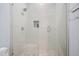 Modern bathroom with a tiled shower and glass doors at 2804 Skyland Ne Dr, Brookhaven, GA 30341