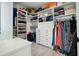 Spacious walk-in closet with custom shelving, drawers, and ample storage for clothes and accessories at 2804 Skyland Ne Dr, Brookhaven, GA 30341