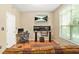 This bedroom features a large window, hardwood floors, and an entertainment center with speakers at 539 Mcgill Park Ne Ave, Atlanta, GA 30312