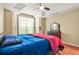 Bedroom featuring hardwood floors, natural lighting, a ceiling fan and a dresser at 539 Mcgill Park Ne Ave, Atlanta, GA 30312