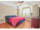 Bedroom featuring hardwood floors, natural lighting, a ceiling fan and a dresser at 539 Mcgill Park Ne Ave, Atlanta, GA 30312