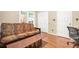 Bedroom area with hardwood floors, neutral paint, and a workstation area at 539 Mcgill Park Ne Ave, Atlanta, GA 30312