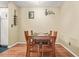 Cozy dining area with hardwood floors and a wine rack at 539 Mcgill Park Ne Ave, Atlanta, GA 30312