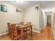 Dining room with hardwood floors and adjacent to the kitchen and hallway at 539 Mcgill Park Ne Ave, Atlanta, GA 30312