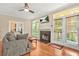 Comfortable living room with a fireplace and access to an outdoor patio at 539 Mcgill Park Ne Ave, Atlanta, GA 30312