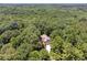 Secluded home nestled in a lush, densely wooded area at 6960 Worley Rd, Cumming, GA 30028
