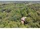 This property features complete privacy and mature trees at 6960 Worley Rd, Cumming, GA 30028