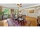 Cozy dining room with a view, hardwood floors, and neutral wall paint at 12162 Mountain Laurel Dr, Roswell, GA 30075