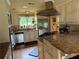 Well-equipped kitchen featuring stainless steel appliances, granite countertops, and plenty of cabinet space at 12162 Mountain Laurel Dr, Roswell, GA 30075