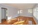 Spacious bedroom with hardwood floors and ample natural light at 1496 S Hairston Rd, Stone Mountain, GA 30088